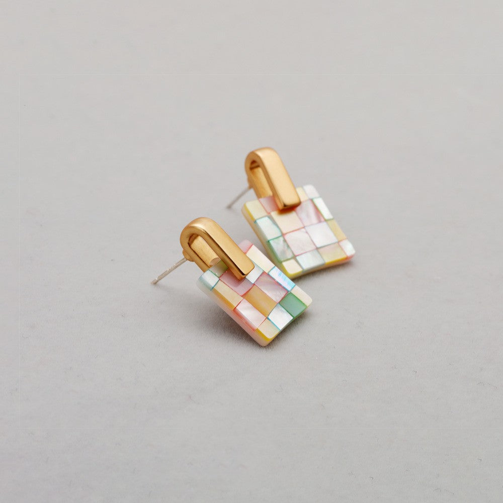 Orecchini conchiglia stile geometrico