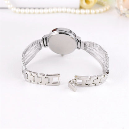 Orologio con cinturino a maglie dorate