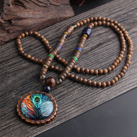 Collana piuma pavone
