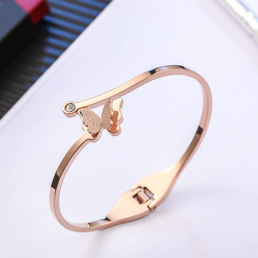 Bracciale titanio oro rosa farfalla