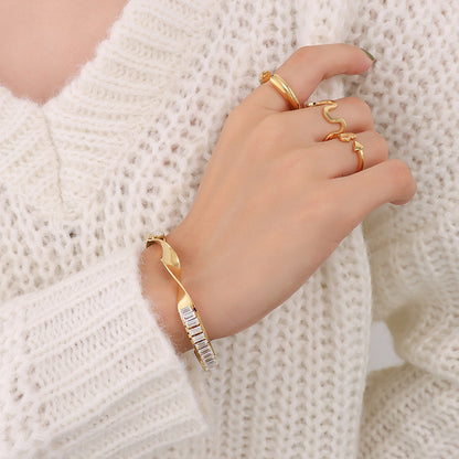 Bracciale geometrico zirconi aperto