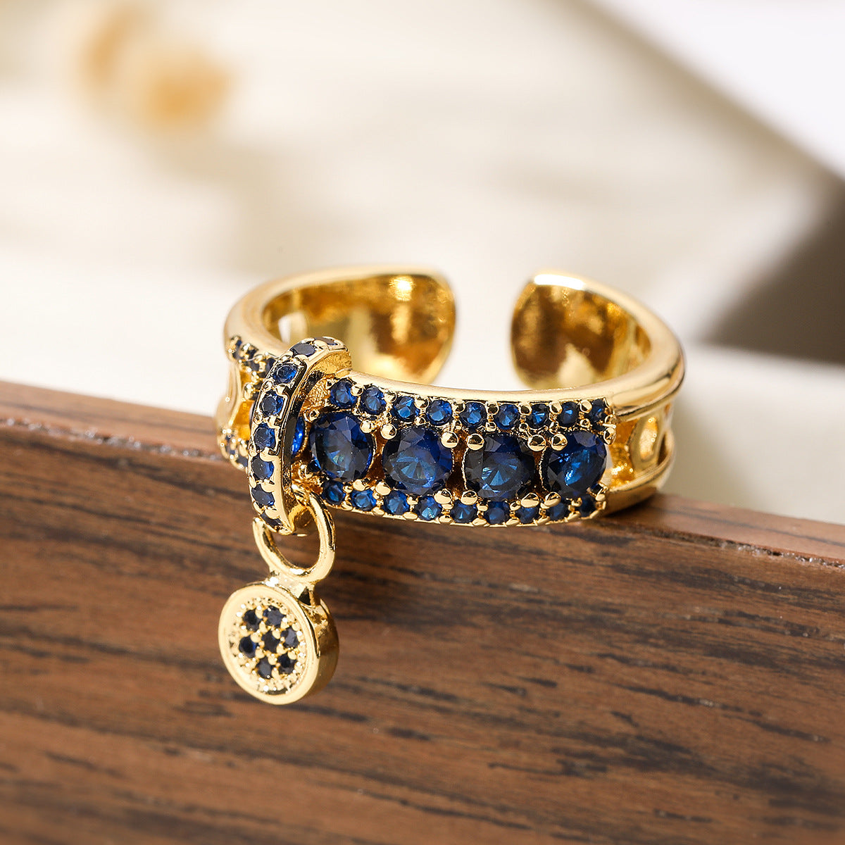 Anello geometrico aperto con zircone