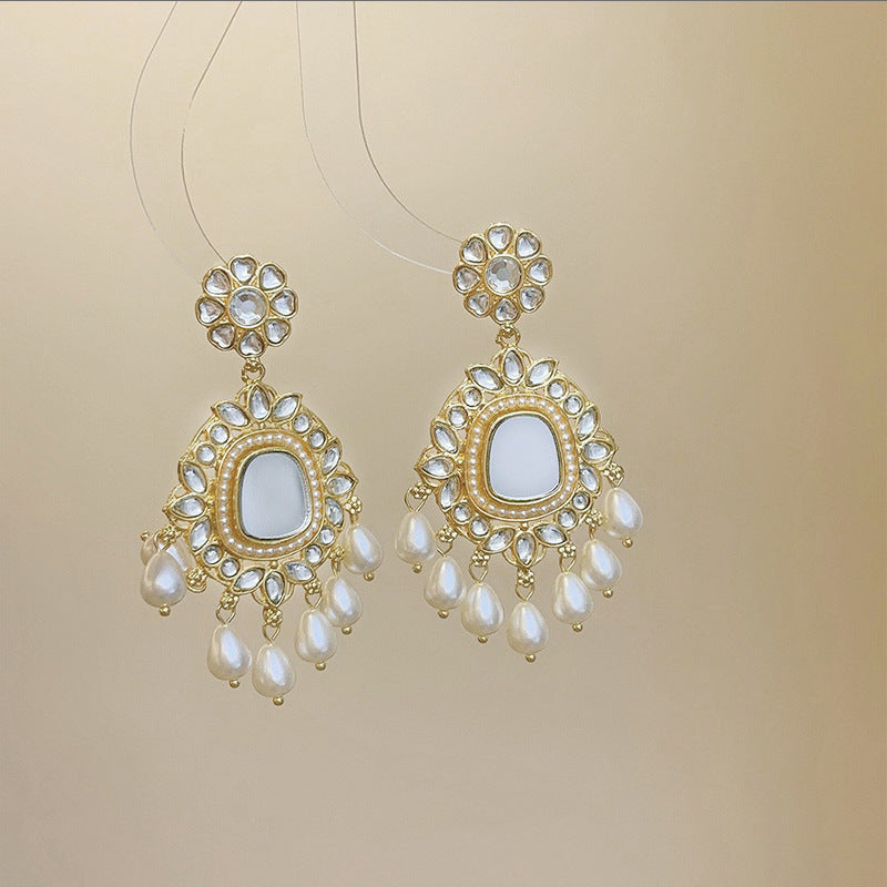 Set collana orecchini fiore con nappa