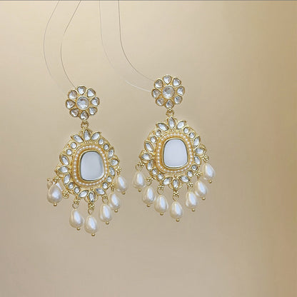 Set collana orecchini fiore con nappa