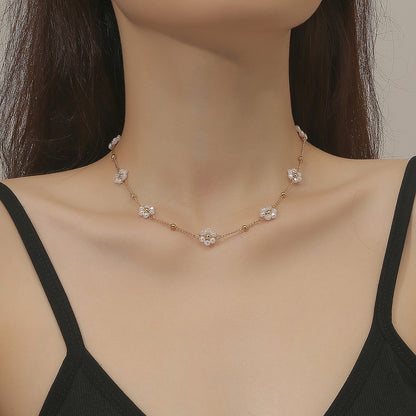 Collana perline fiori