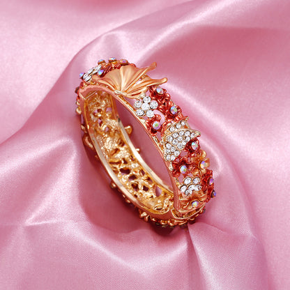 Bracciale farfalla e fiore aperto