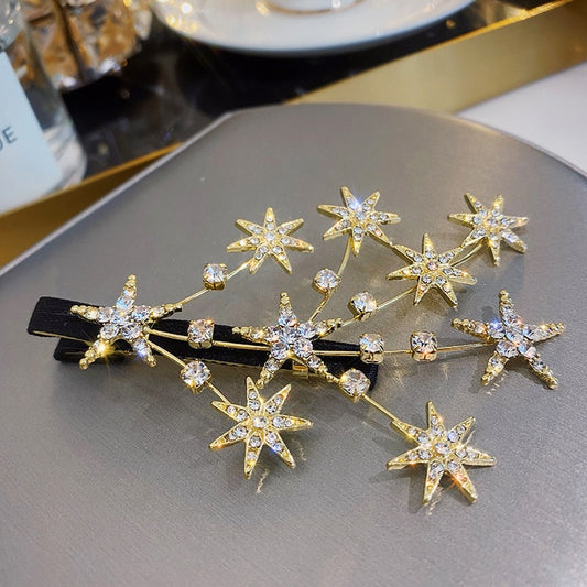 Fermaglio stella strass