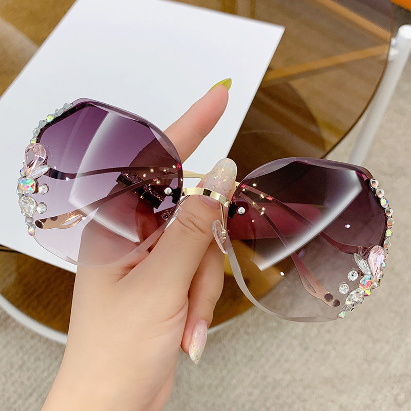 Occhiali da sole senza montatura con strass