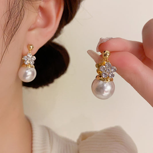 Orecchini fiore con perla reversibili