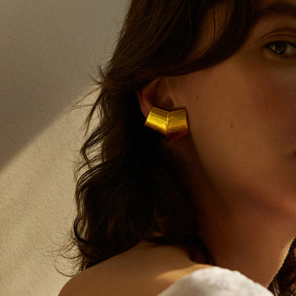 Orecchini geometrici oro acciaio