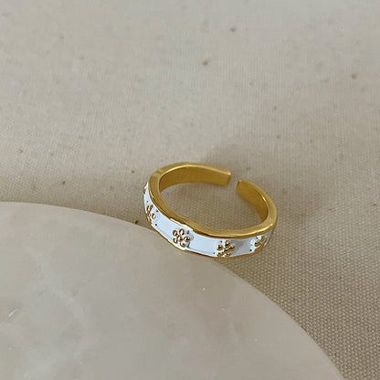 Anello farfalla e fiore viola