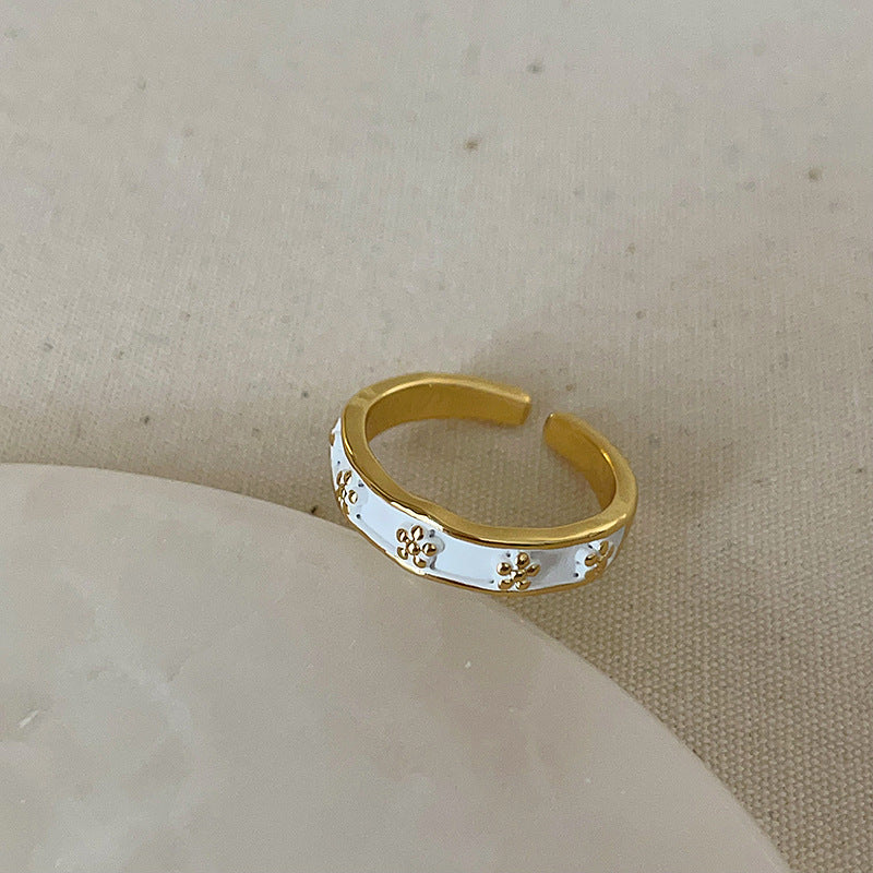 Anello farfalla e fiore viola