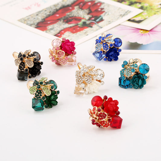 Anello fiore resina cristalli