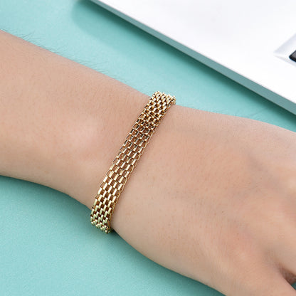 Bracciale titanio twist oro