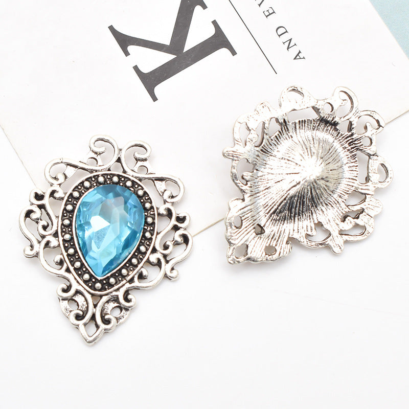 Spilla fiore goccia argento