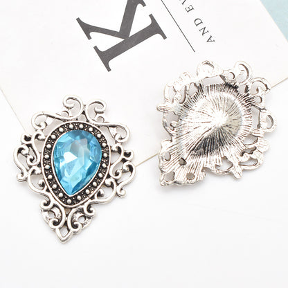 Spilla fiore goccia argento