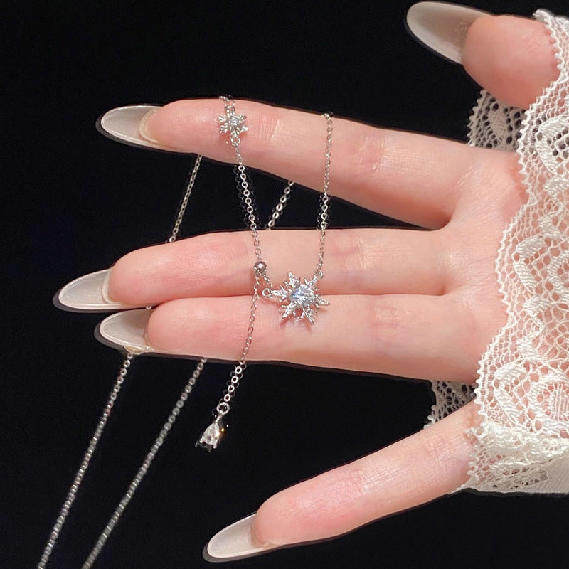 Collana fiocco di neve con nappa