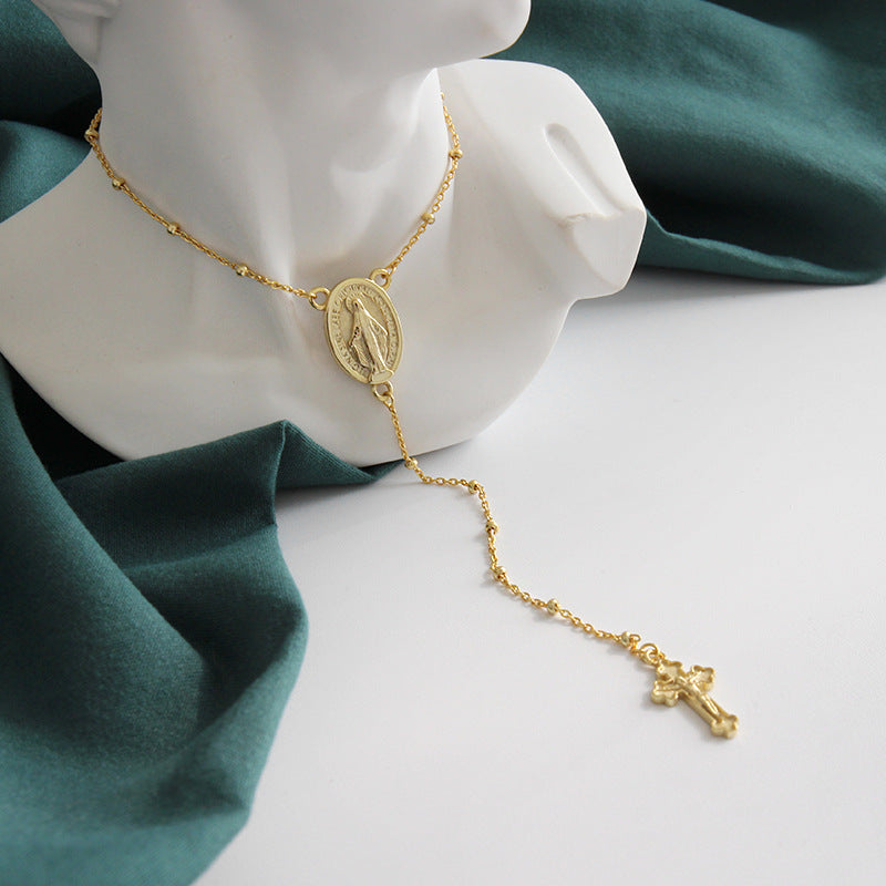 Collana moneta e perle rotonda
