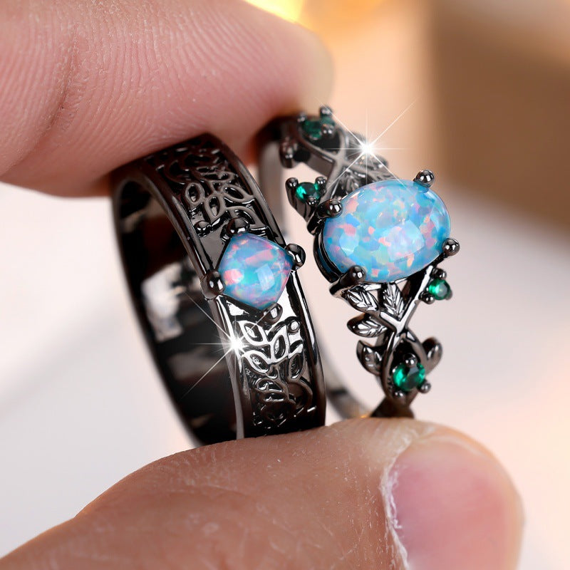 Anello uovo oro nero cristalli blu
