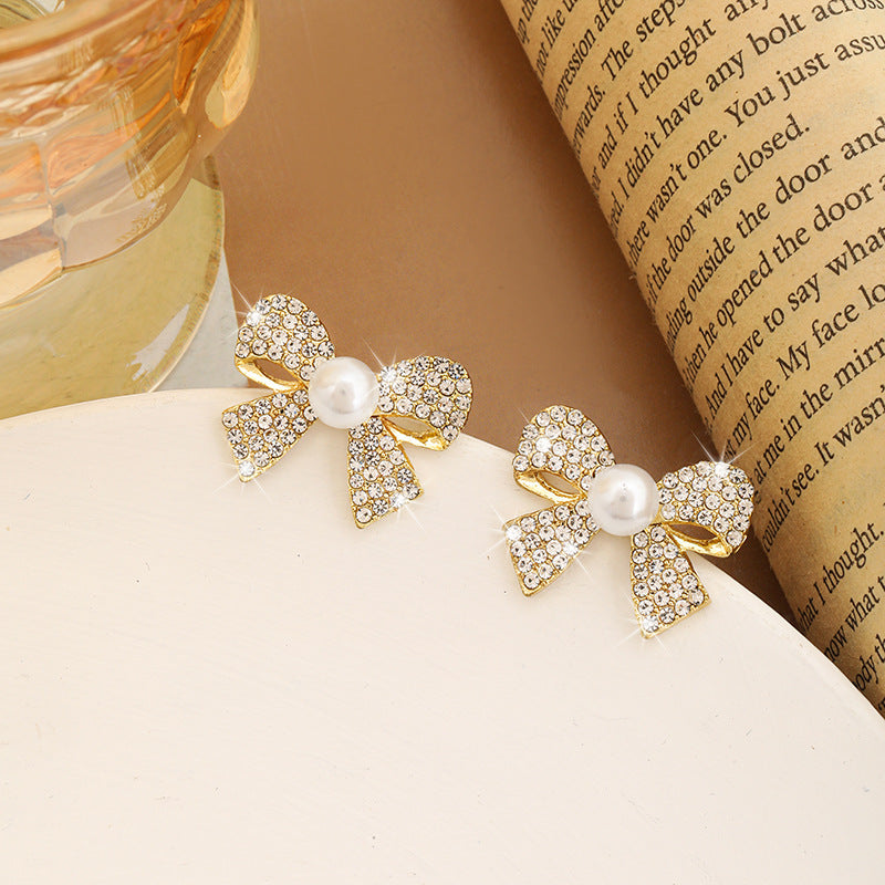 Orecchini farfalla con strass pieni