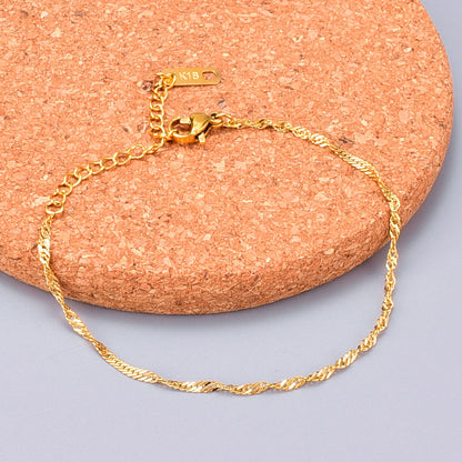 Bracciale titanio placcato oro a spira