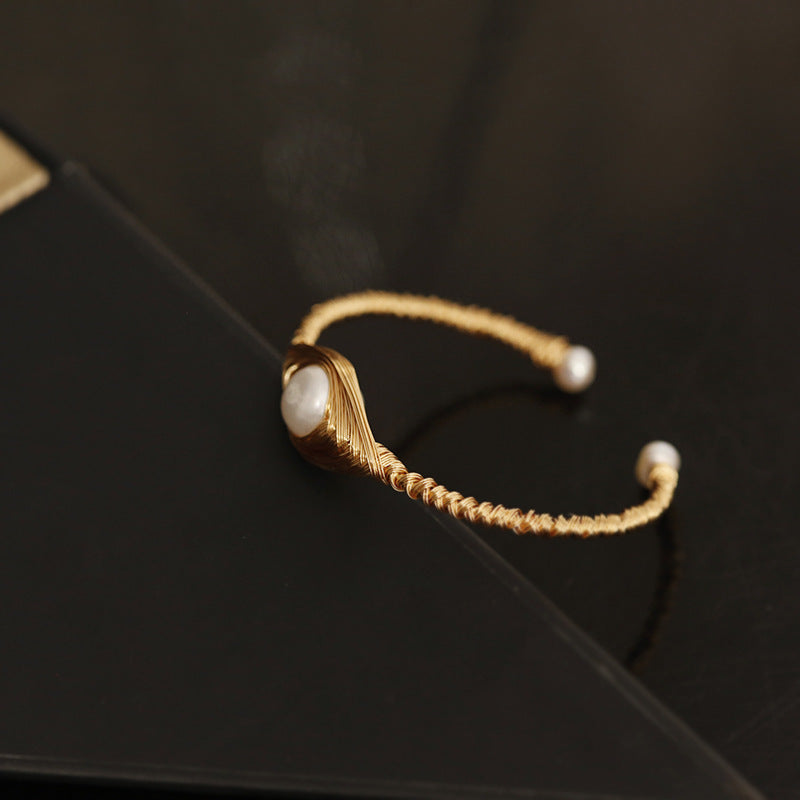 Bracciale perla barocca con filo avvolto
