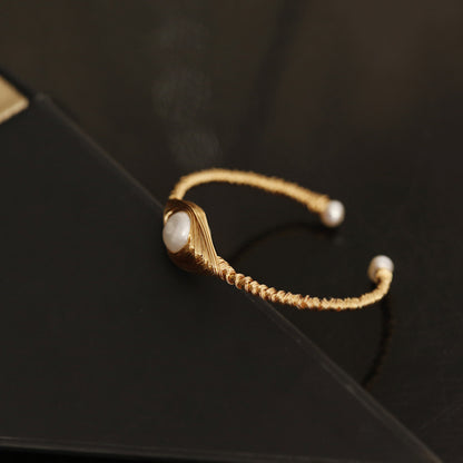Bracciale perla barocca con filo avvolto