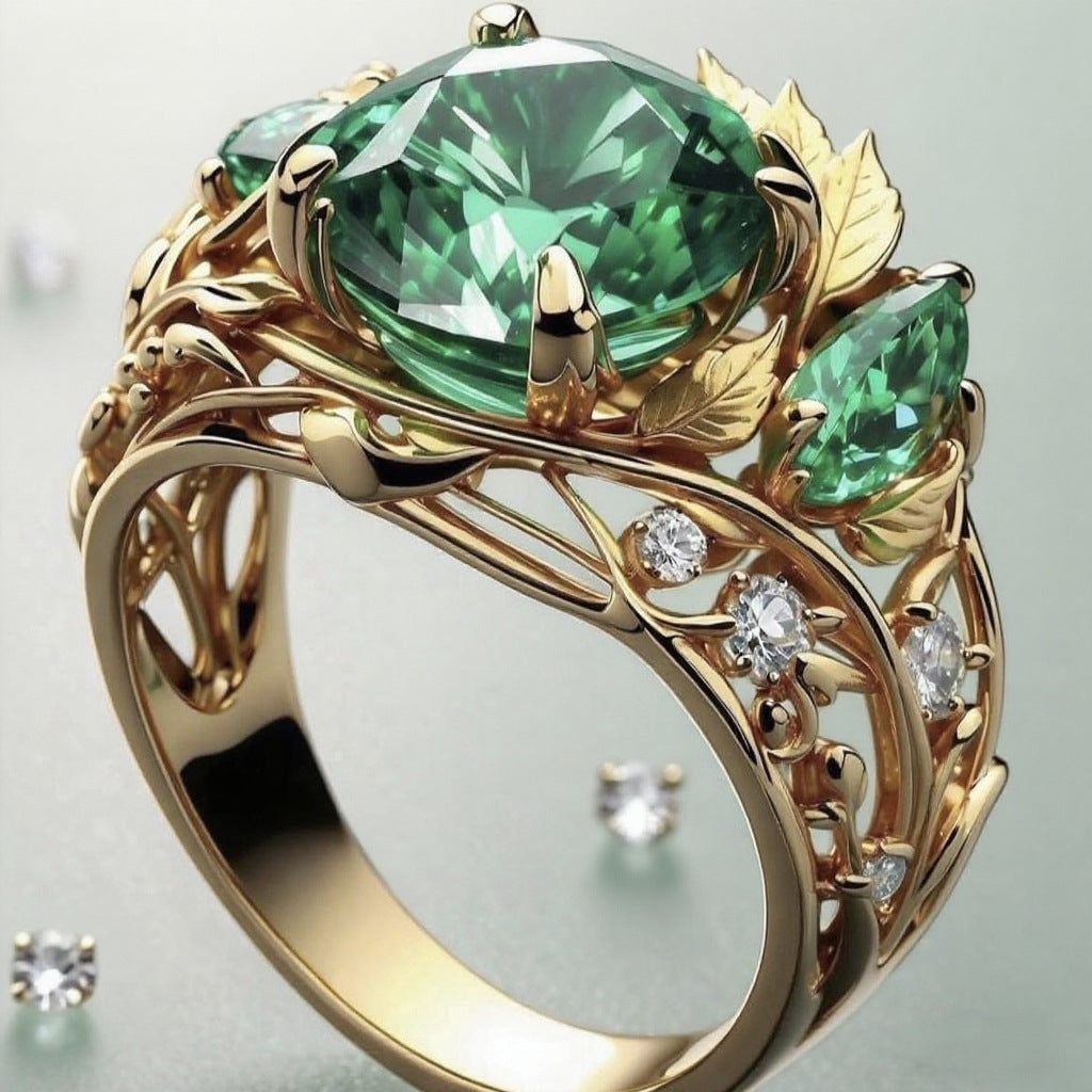 Anello smeraldo e diamanti con decoro floreale