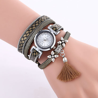 Orologio da donna con fiore e nappa