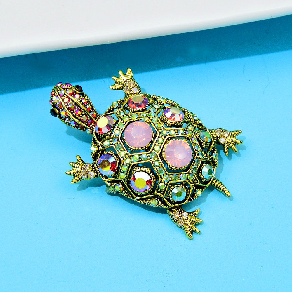 Spilla tartaruga con strass