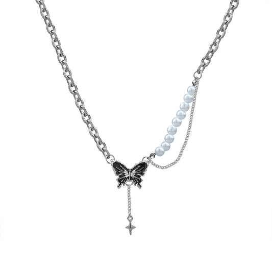 Collana farfalla perle asimmetriche