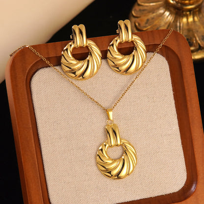 Collana e orecchini floreali