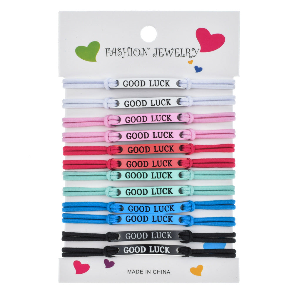 Set bracciali elastici con ciondoli