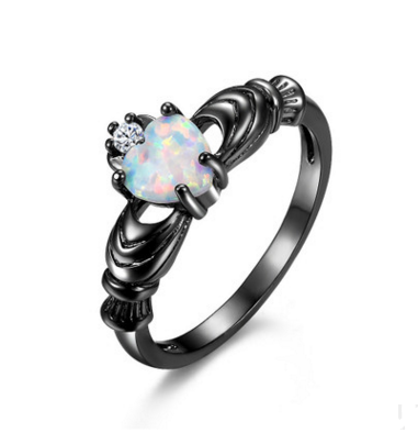 Anello cuore opale con corona