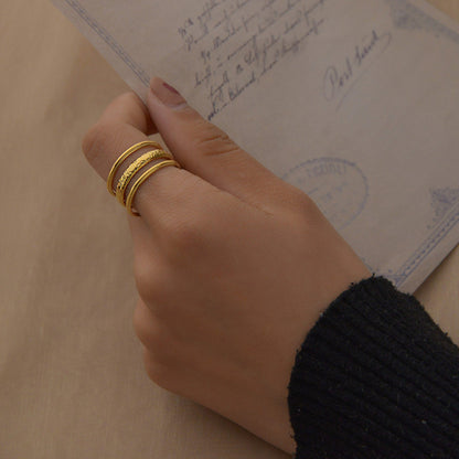 Anello tre righe regolabile