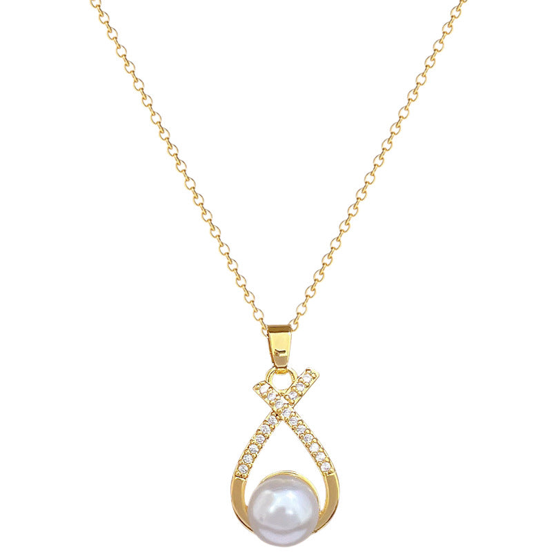 Collana croce con perla e strass