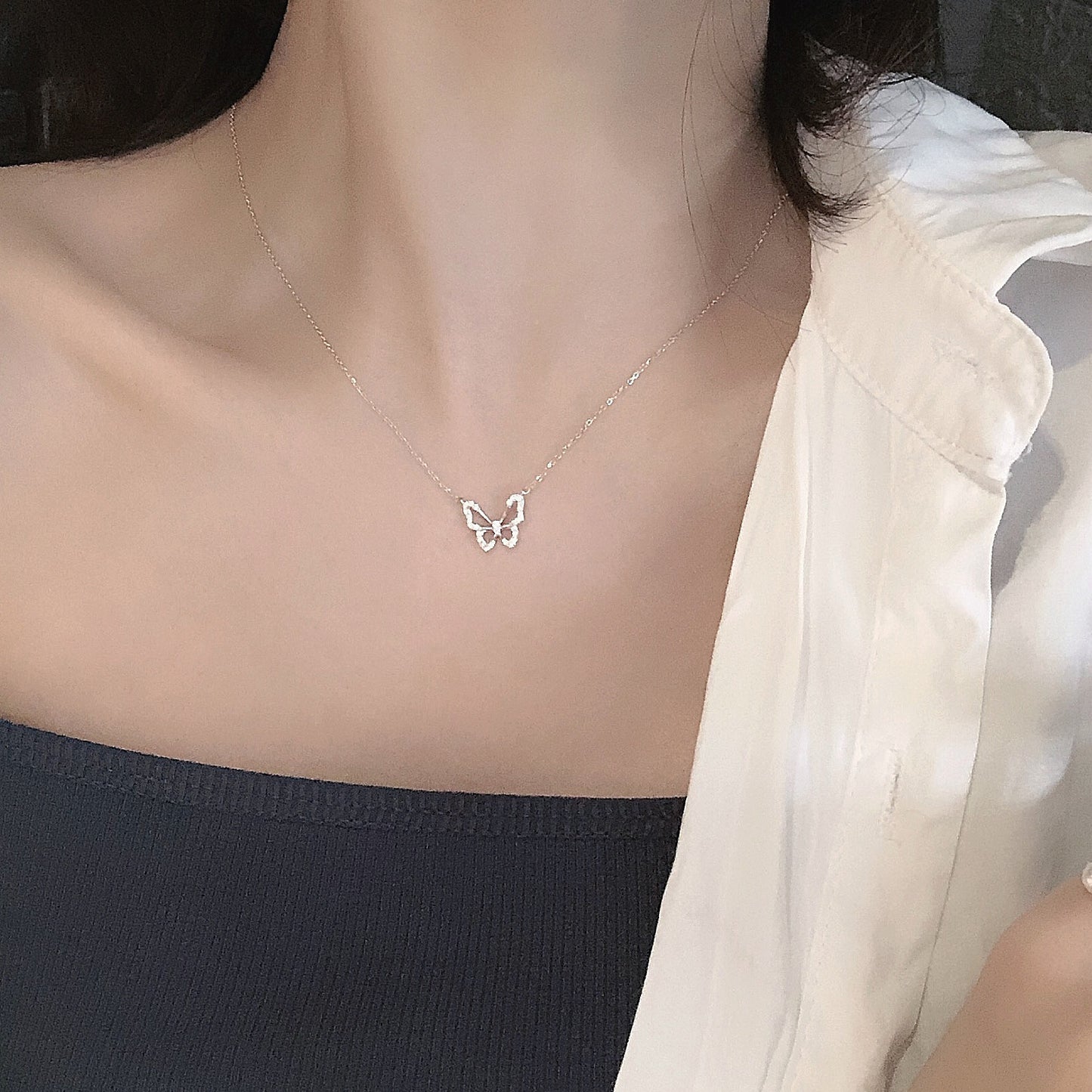 Collana farfalla bicolore placcata