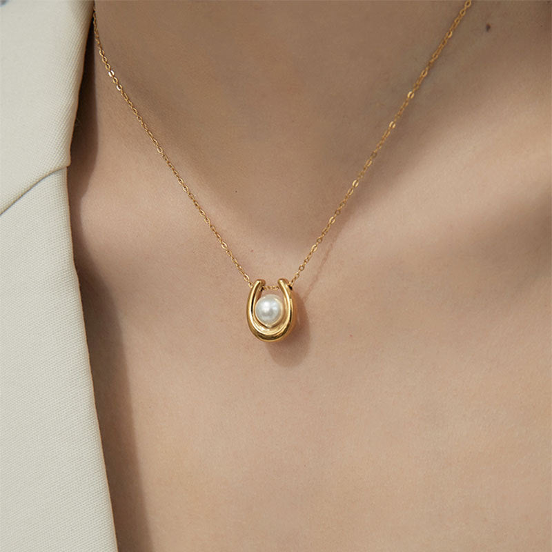 Anello a U perla acciaio titanio
