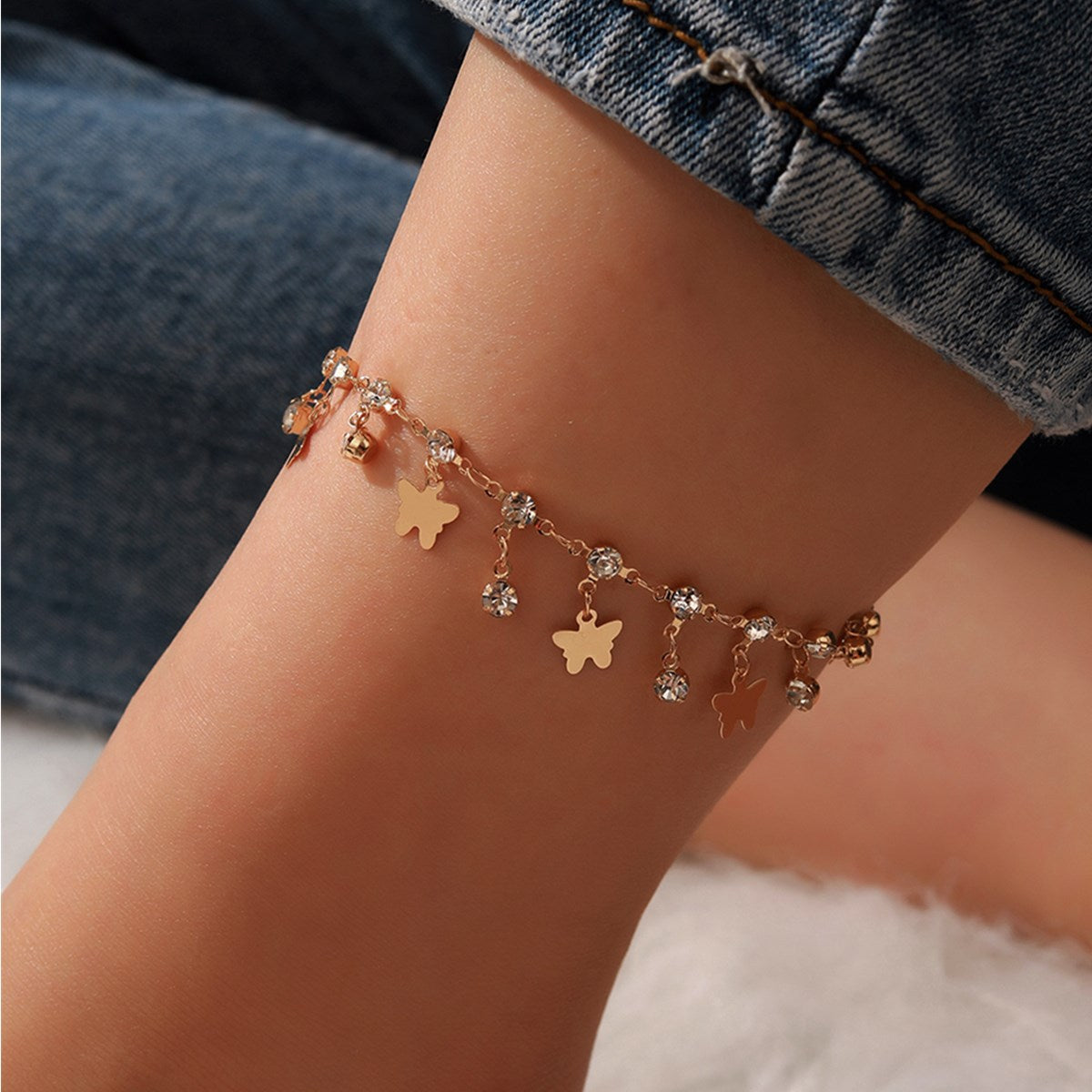 Cavigliera farfalla nappina con strass