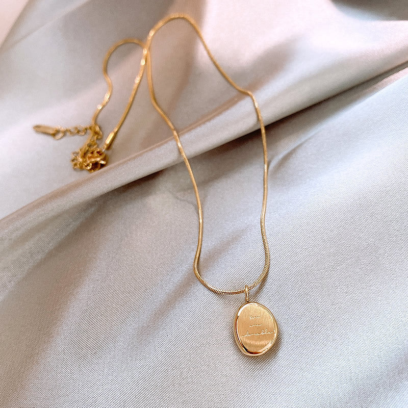 Collana dorata con pendente