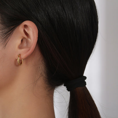 Orecchini twist placcati oro
