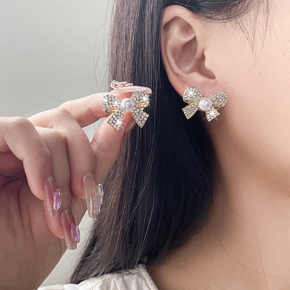 Orecchini farfalla con strass pieni