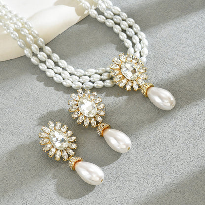 Set collana e orecchini perle geometriche