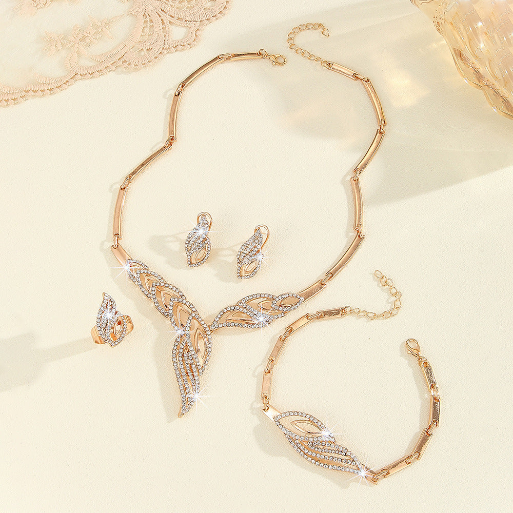Set Gioielli Foglia Oro e Diamanti
