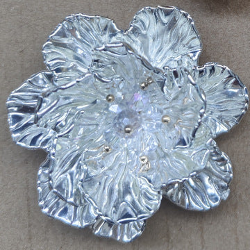 Orecchini fiore bohemien intrecciati