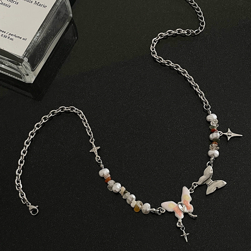 Collana farfalla ricamata