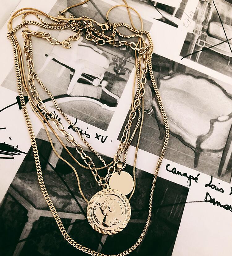 Collana multistrato moneta in oro