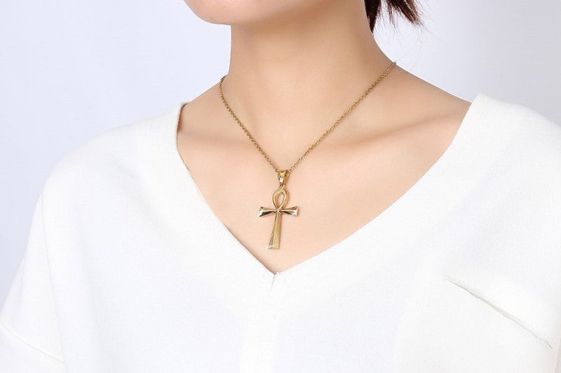 Collana croce dorata acciaio titanio
