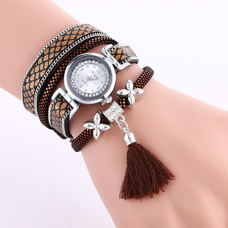 Orologio da donna con fiore e nappa