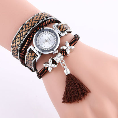 Orologio da donna con fiore e nappa